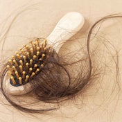 Eine Bürste voller Haare